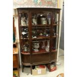 Edwardian Mahogany Display Cabinet with curved glazed sides, the single door opening to reveal three