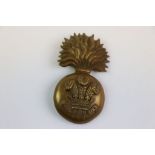 A Royal Welsh Fusiliers All Brass Fur Cap Grenade Badge.