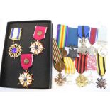 A Collection Of Thirteen Modern And Reproduction Military Medals.