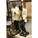Two resin figures of Jazz musicians playing the trumpets with mic on stand, approx. 107cm tall