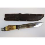 A Vintage William Rodgers Bowie Style Hunting Knife With Leather Sheath.