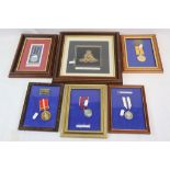A Collection Of Five Framed Medals Together With A Framed Royal Artillery Cloth Badge.