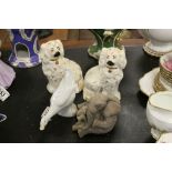 A pair of Royal Doulton Staffordshire dog figures, a Nao duck and an elephant model