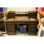 Victorian Pedestal Desk of Nine Drawers with a superstructure including two banks of four drawers,