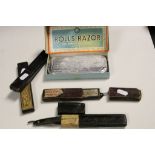 Four vintage boxed Cut throat Razors & a boxed Rolls Razor