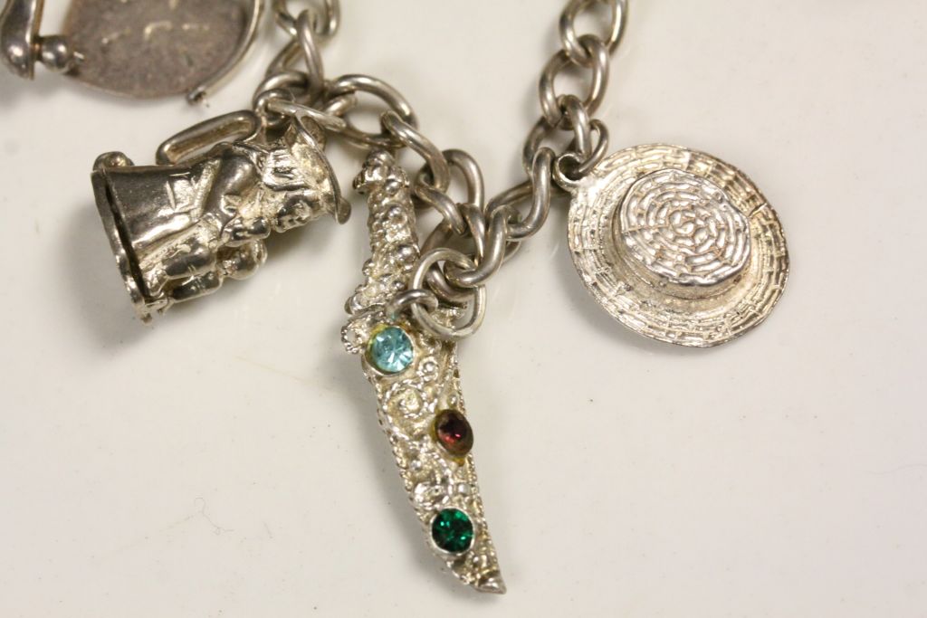 Hallmarked Silver Charm bracelet with various charms to include; Crown, Rocking Chair, Toby Jug etc - Image 2 of 6