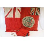 A Collection Of Three British Military Related Flags To Include A Navy Red Ensign.