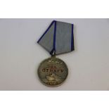 A Russian Soviet Full Size Medal For Bravery, Established 17/10/38. No.2280504.