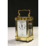 Vintage Brass cased Carriage Clock with wavy edge design, bevelled Glass panels & Enamel dial, comes