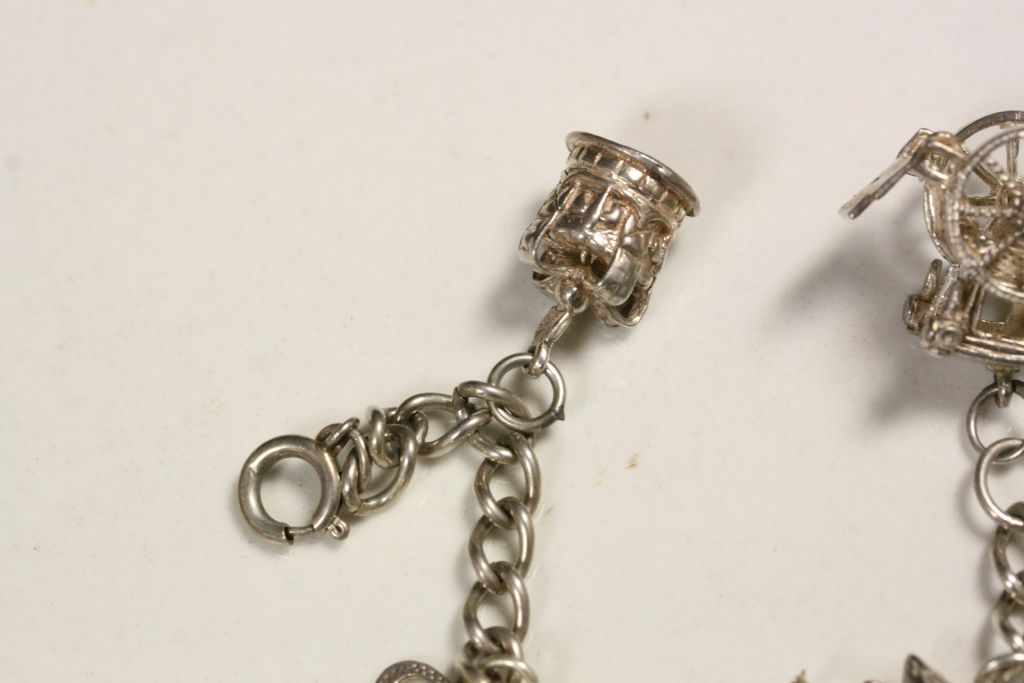 Hallmarked Silver Charm bracelet with various charms to include; Crown, Rocking Chair, Toby Jug etc - Image 5 of 6