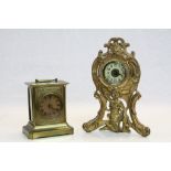 Early 20th Century brass carriage style clock and a gilded bracket clock with figurative decoration