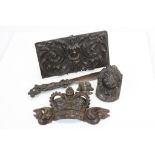 An antique Blackforest style letter opener with carved squirrel decoration, a carved 18th century