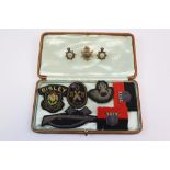 A Collection Of Vintage Military Metal And Cloth Badges To Include Enamel ASC Collar Badges And