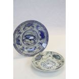 Two Chinese blue & white Ming Dynasty type dishes, both signed to base, the larger example approx