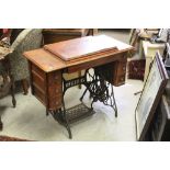 Early 20th century Oak Singer Sewing Machine Treadle Table with Six Drawers and Iron Base, 92cms