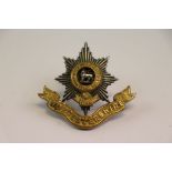 A Worcestershire Regiment Officers Cap Badge In White Metal And Brass Construction With Three