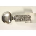 Swedish white metal serving type Spoon with ornate Traditional artwork to the handle, signed "H