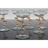 Set of six Glass Champagne glasses with figural stems, designed by Bimini Werkstatte and each approx