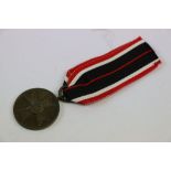 A Full Size World War Two / WW2 German War Merit Medal With Original Ribbon.