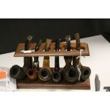 Nine vintage Tobacco Pipes & stand to include "Peterson's System", pipe cleaners, pipe tamper & a