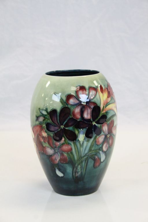 Vintage Moorcroft Pottery vase, hand painted with "Spring Flowers", stands approx 18cm is fully