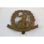 A The Norfolk Regiment All Brass Cap Badge With Brass Slider To The Rear.
