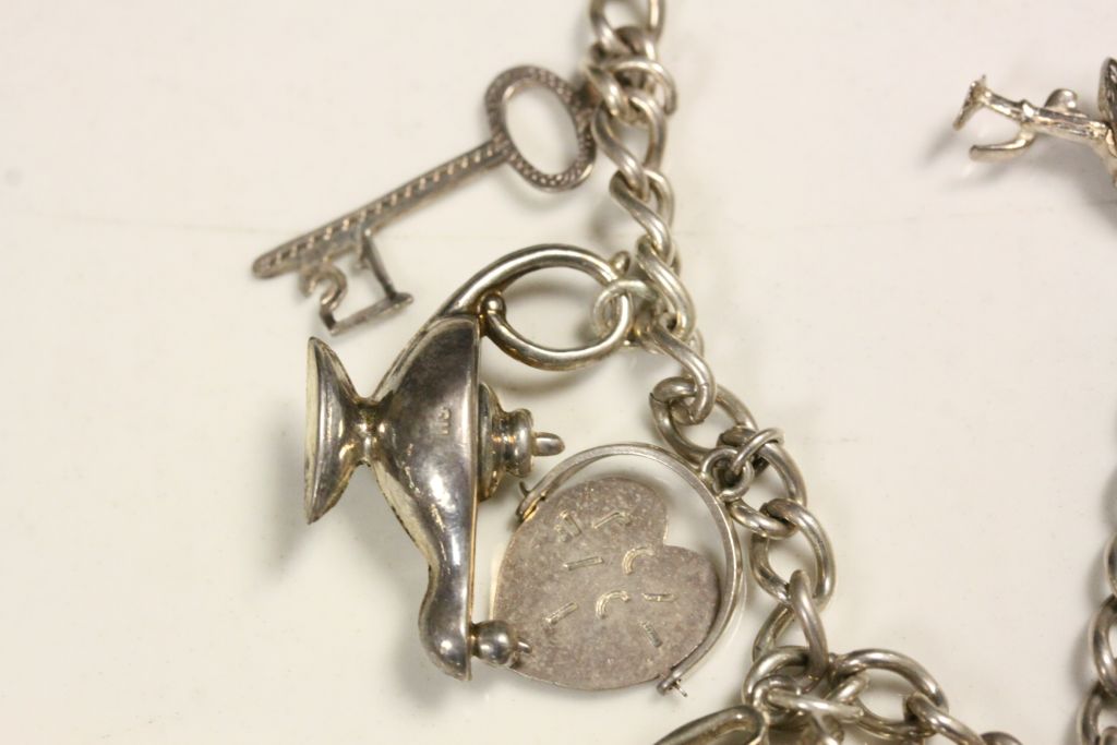 Hallmarked Silver Charm bracelet with various charms to include; Crown, Rocking Chair, Toby Jug etc - Image 6 of 6