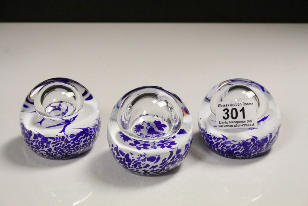 Three Caithness Glass Paperweights, blue & white design with internal Air bubbles to include;