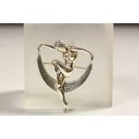 Silver Art Deco style brooch of a lady