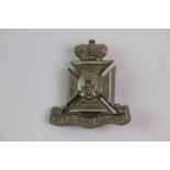 A World War Two / WW2 The Wiltshire Regiment Plastic Economy Cap Badge With Metal Fixing To The