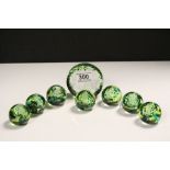 Caithness set of eight Glass Disney Paperweights to include the Seven Dwarves and Dwarves Cottage,