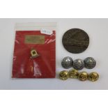 A Small Collection Of Militaria To Include A Lusitania Medal, A Wiltshire Regiment Badge And A