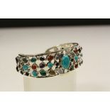 Substantial silver bangle inset with Amethyst, Tigers Eye and Turquoise