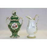 A green ground continental lidded vase decorated with hand painted floral panels and a 19th