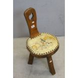 Mid 20th century Elm Three Legged Chair with Tooled Leather Covered Seat decorated with a Fox