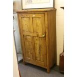 19th Century pine storage cupboard with panelled door and two shelves