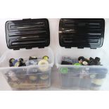 Two large boxes containing a large quantity of remote control car spare parts to include engines,