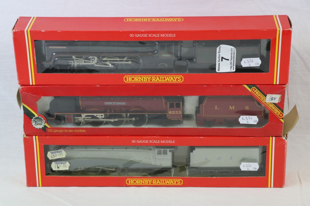 Three boxed Hornby OO gauge locomotives to include R312 LNER 4-6-2 Loco Silver Link, R329 BR 4-6-2