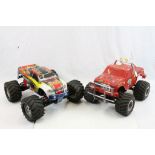 A Traxxas Top Fuel Remote control pick-up truck together with a crusher remote control pick-up