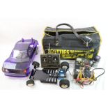 A 1/10th scale petrol remote control car complete with spare chassis, MFA Power panel and remote