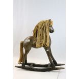 Vintage carved toy Wooden Rocking Horse with string mane & tail, stands approx 65cm at the highest