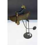 Folk Art style hand painted Pendulum Toy depicting a Man Rowing a Boat, stands approx 43.5cm