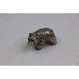 Silver figure of a grizzly bear