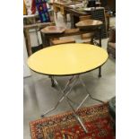 Mid 20th century Circular Folding Table with Formica Wood Effect Finish to top and Tubular Chrome