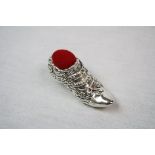 Silver Victorian style pincushion shoe with ruby lace holder
