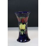 Moorcroft Pottery flared Vase in "Wisteria" pattern, stands approx 21cm