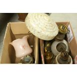 Two boxes containing a quantity of vintage lamps and shades