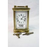 Key wind French Brass Carriage Clock with bevelled Glass panels & Enamel Dial, measures approx 12