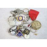 Box of small collectables including silver watch chain, plus fobs, military buttons, watches, badges