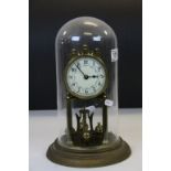 Vintage glass dome cased skeleton clock